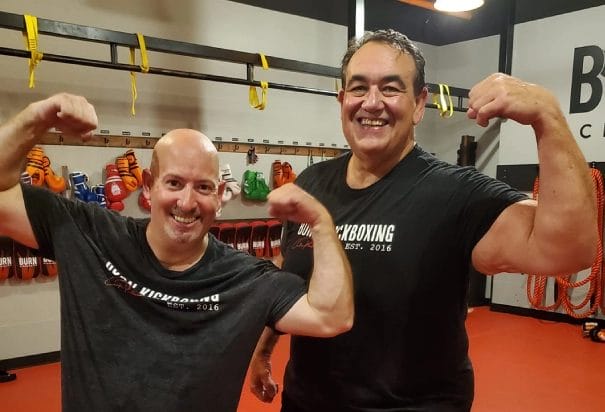 two mans show biceps