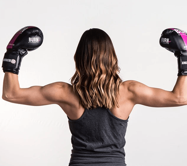 woman hard training at Burn Kickboxing
